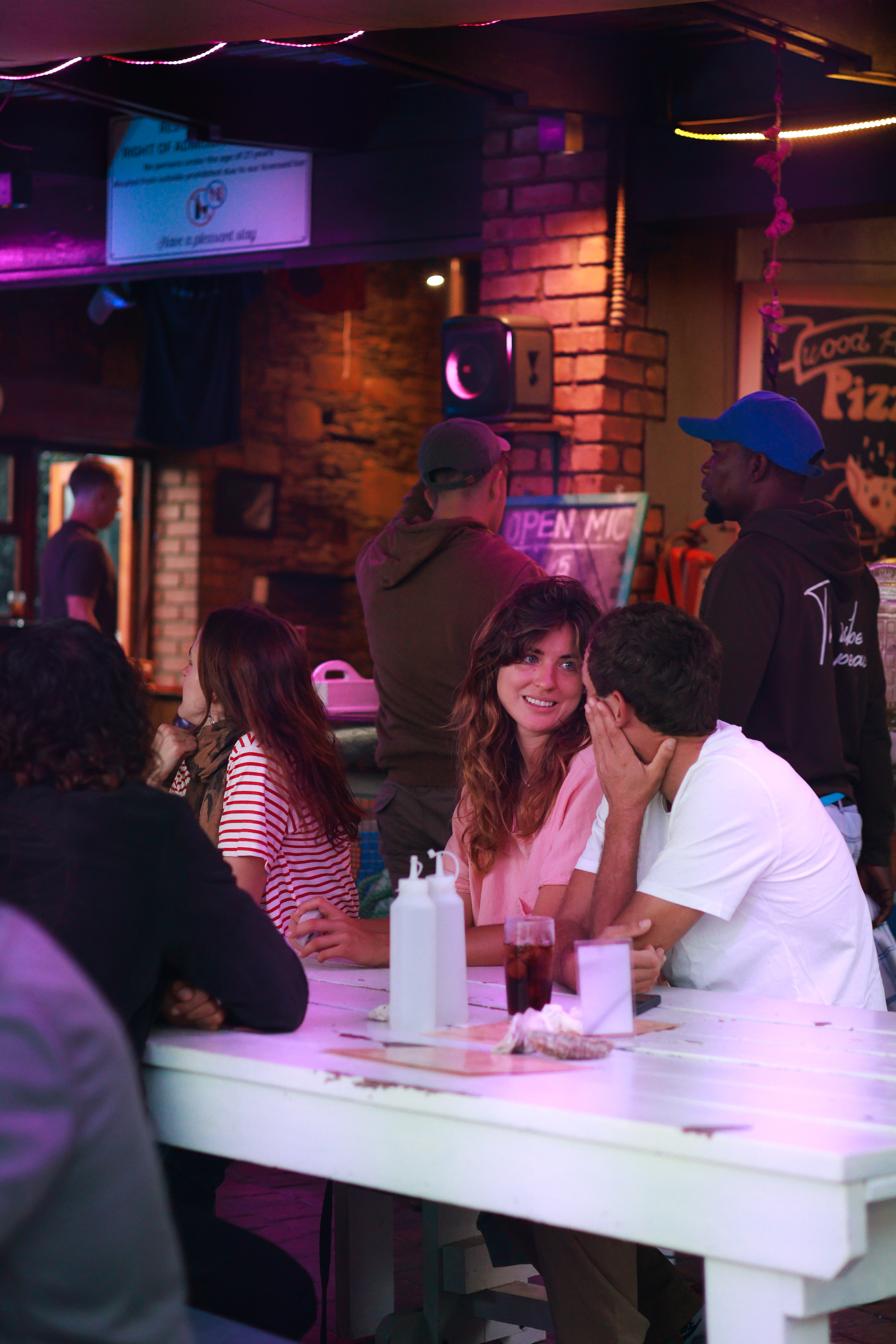 Beach House bar and resin counter glowing in the evening