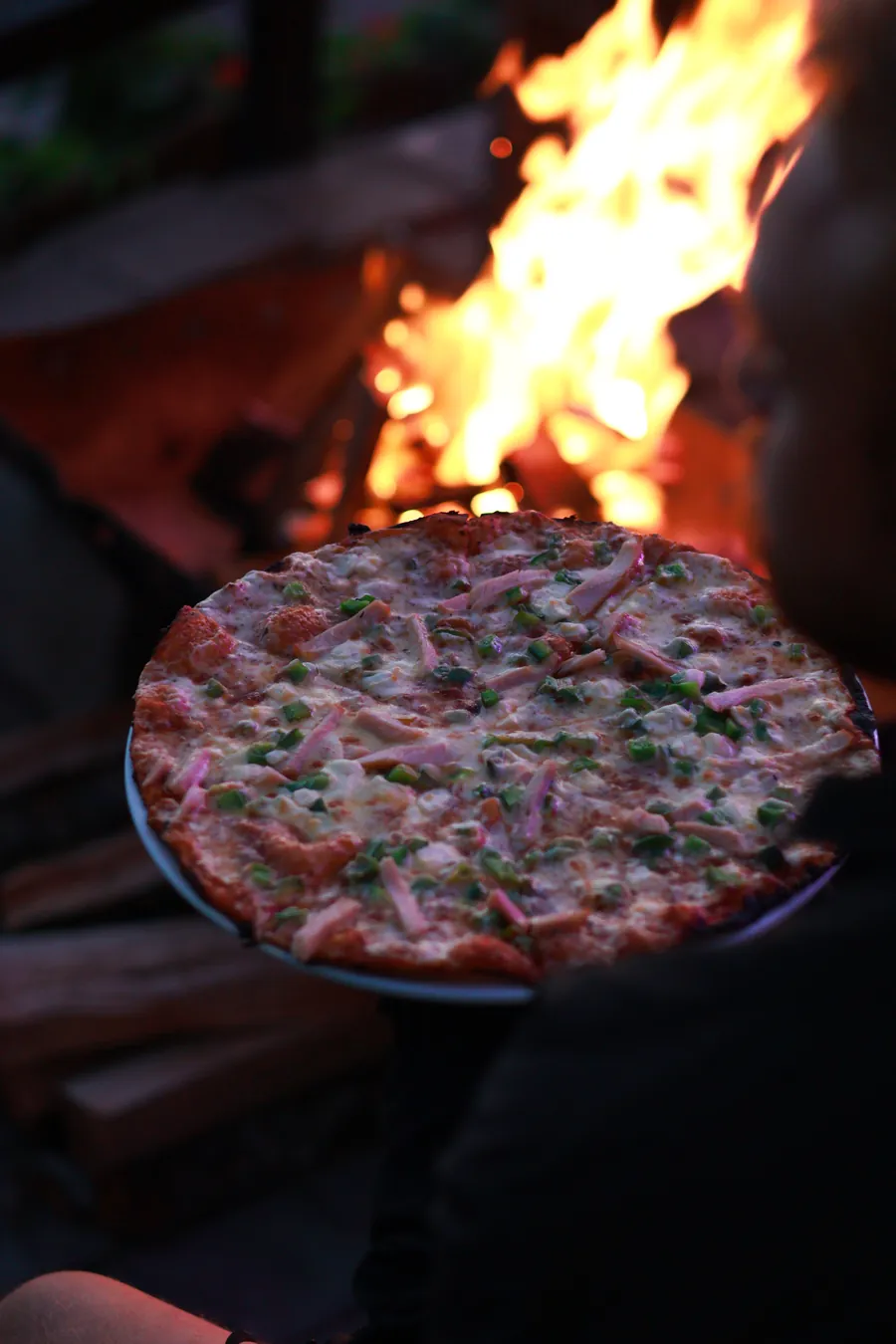 Wood-fired pizza at Wilderness Beach House Backpackers